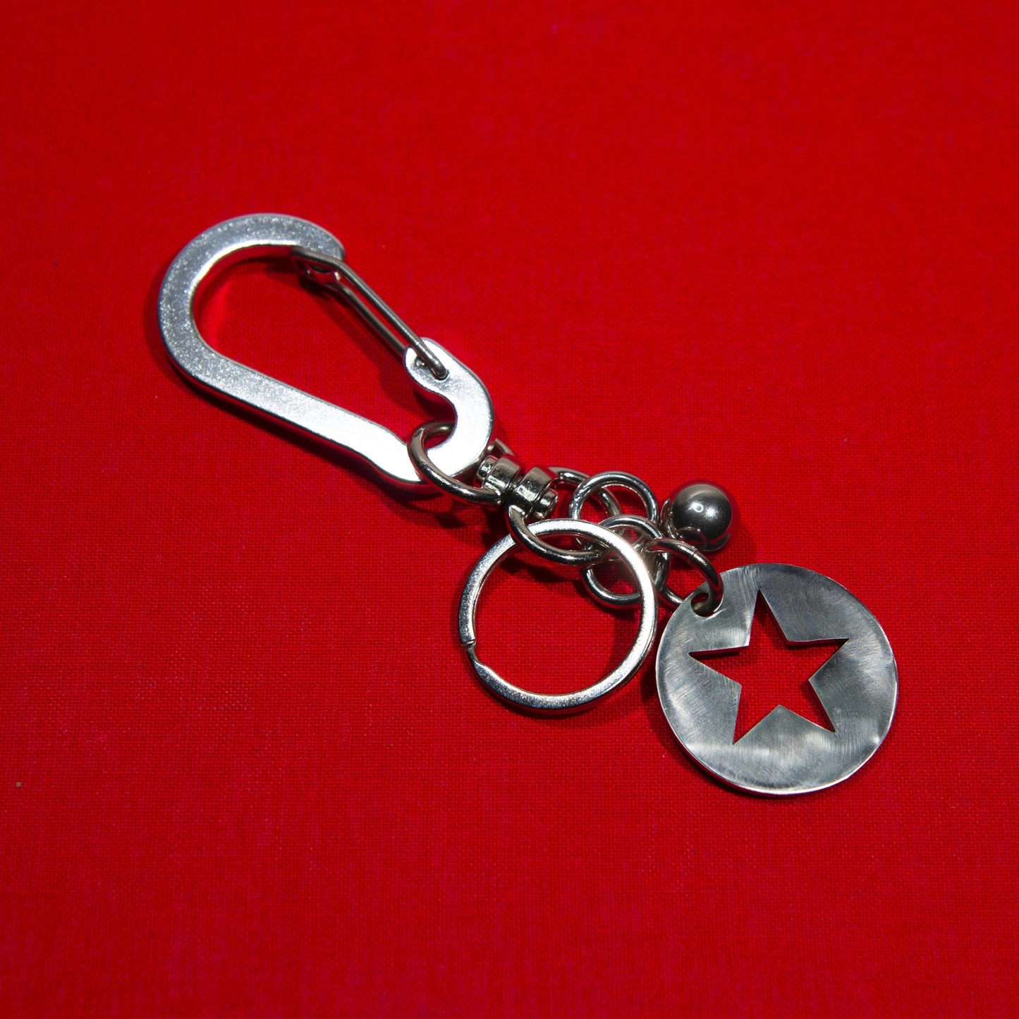 porte-clés étoile en acier inoxydable. porte-clé rock. porte-clé glam rock